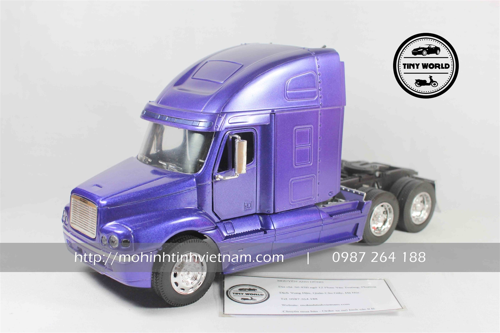 MÔ HÌNH ĐẦU KÉO FREIGHTLINER (TÍM) 1:32 NEWRAY