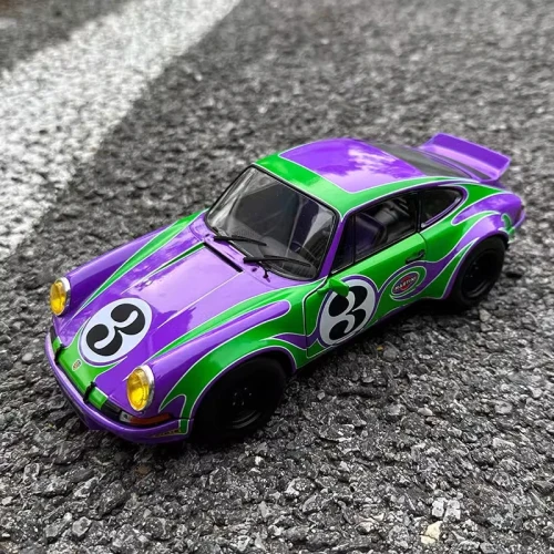 MÔ HÌNH Ô TÔ PORSCHE 911 RSR MARTINI PAINT 1973 (TÍM) 1:18 SOLIDO