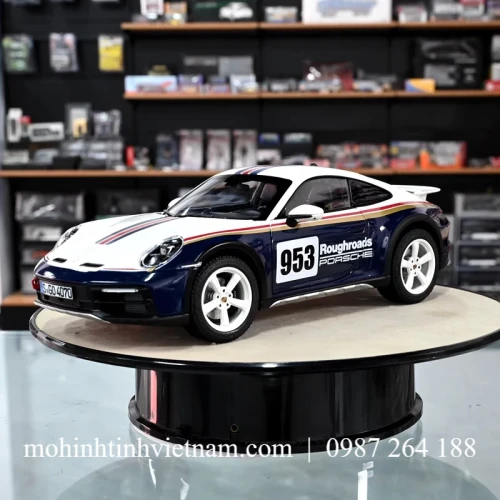 MÔ HÌNH Ô TÔ PORSCHE 911 DAKAR 2023 (TÍM) 1:18 NOREV