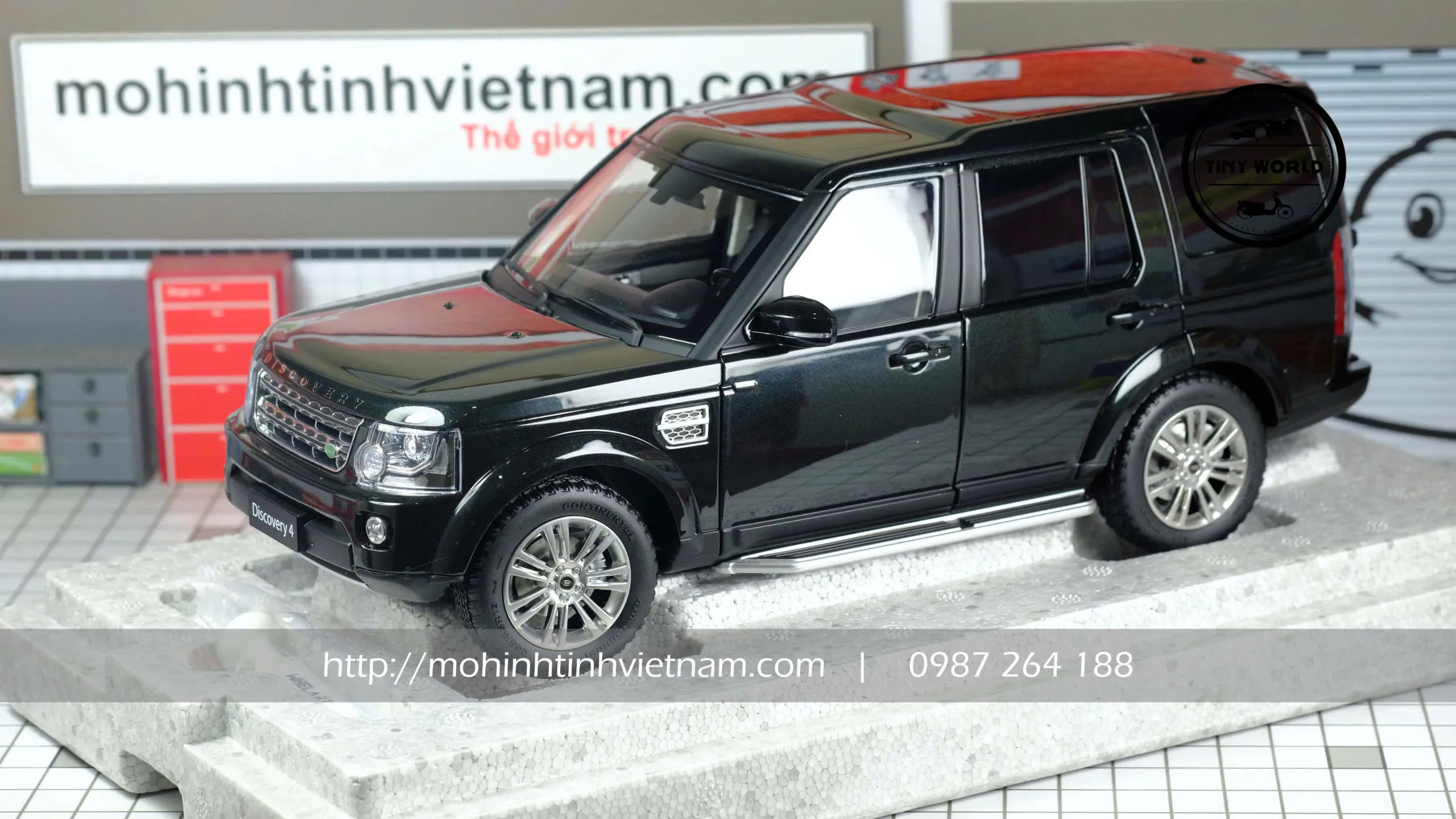 MÔ HÌNH Ô TÔ LAND ROVER DISCOVERY 4 (ĐEN) 1:18 WHELART